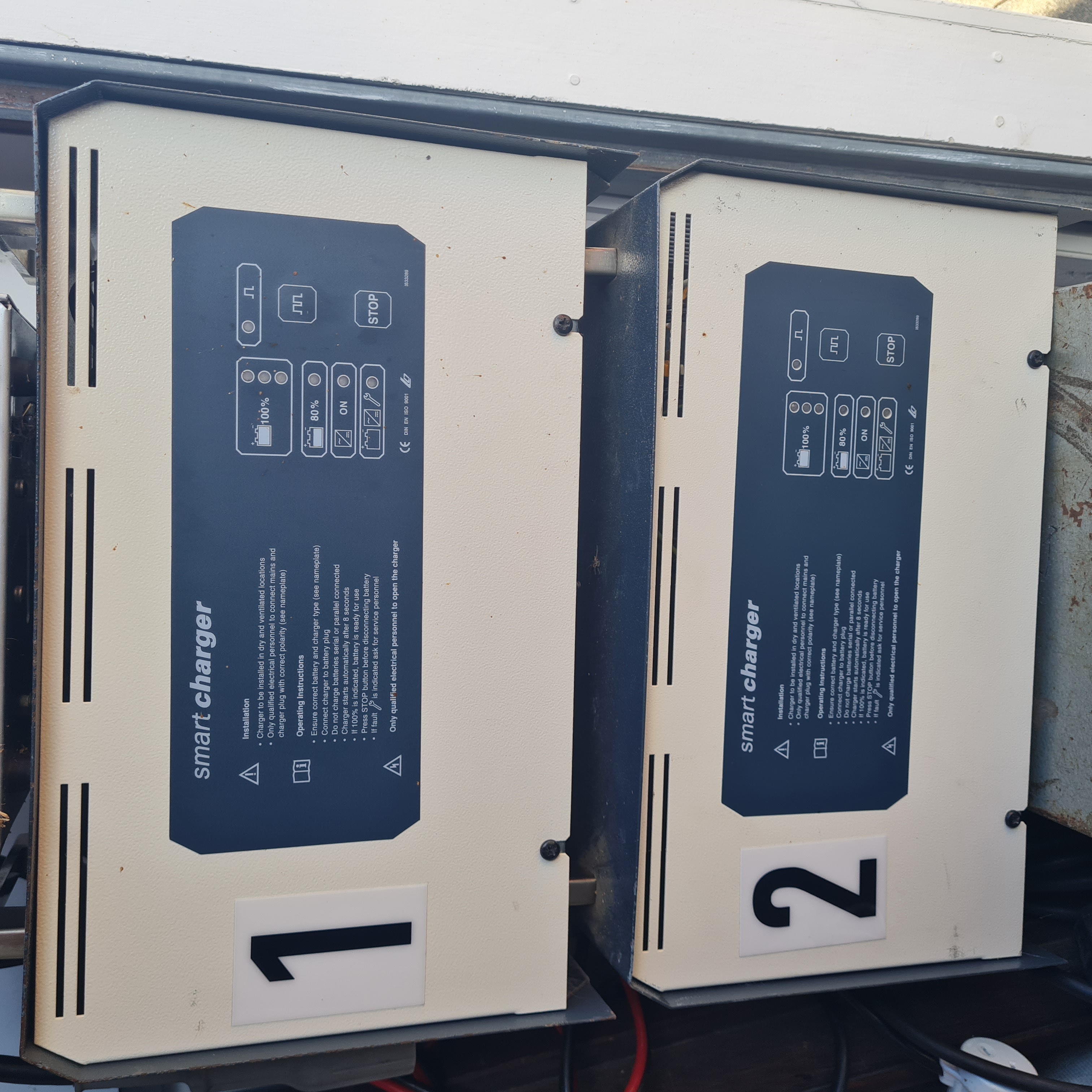Two smart golf cart charger units