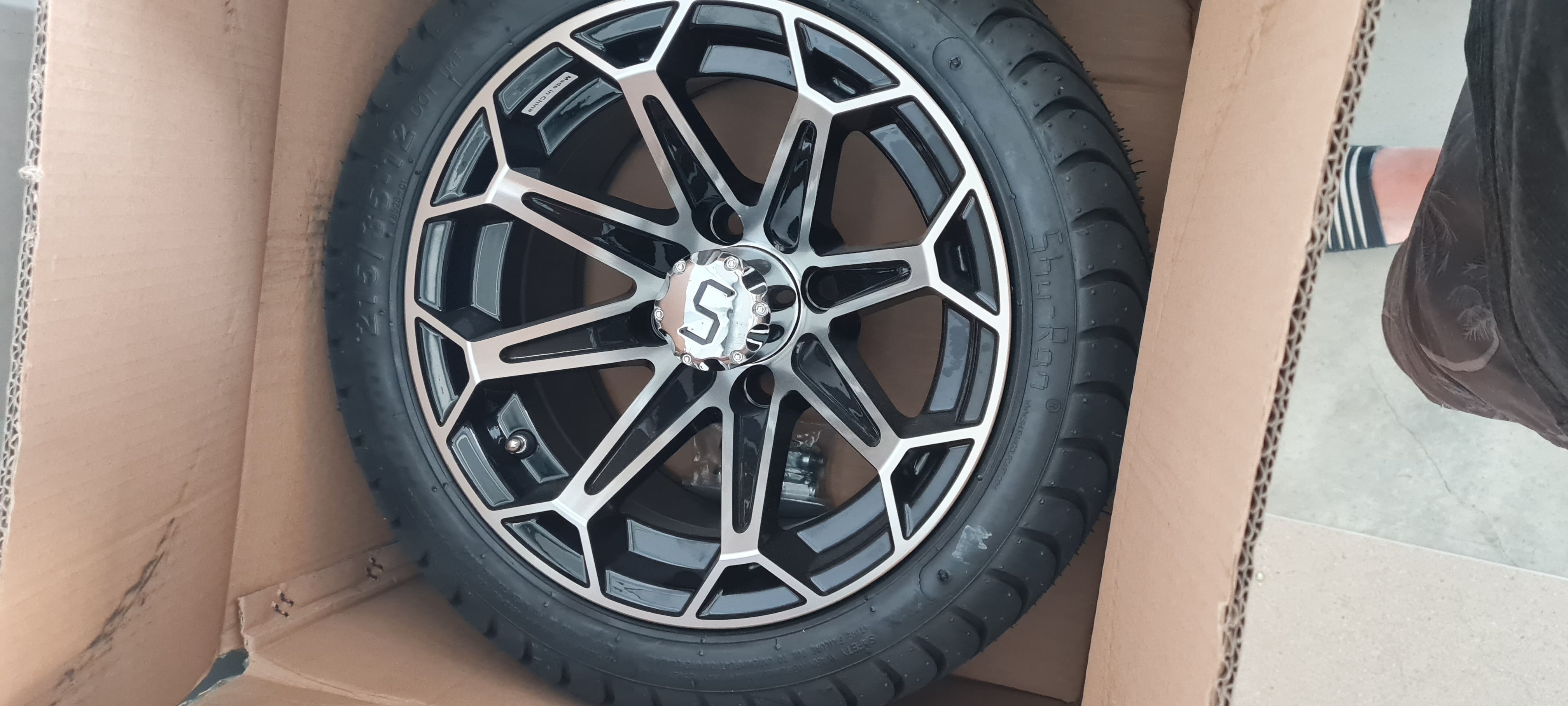 Black machined multi-spoke mag wheel with street tyre