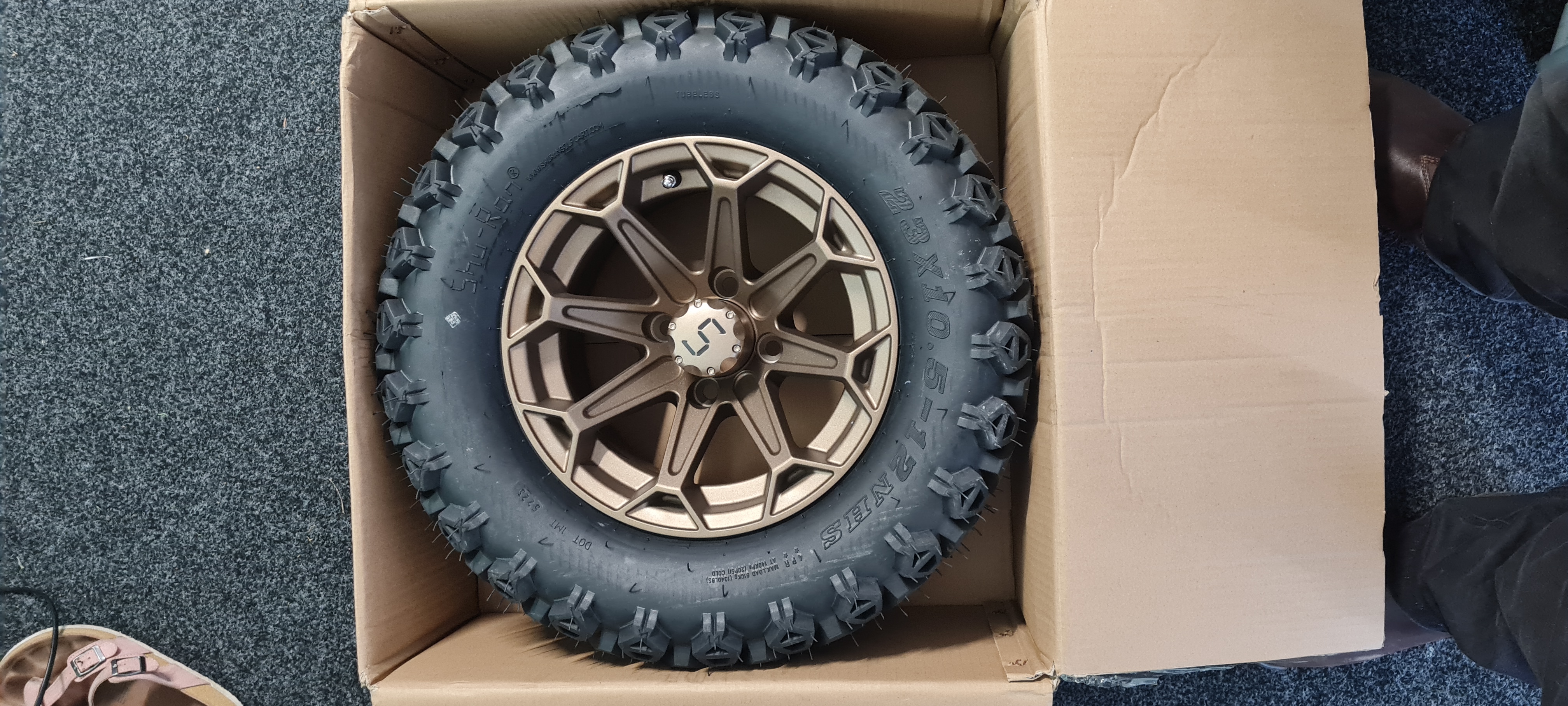 Bronze off-road mag wheel with chunky all-terrain tyre