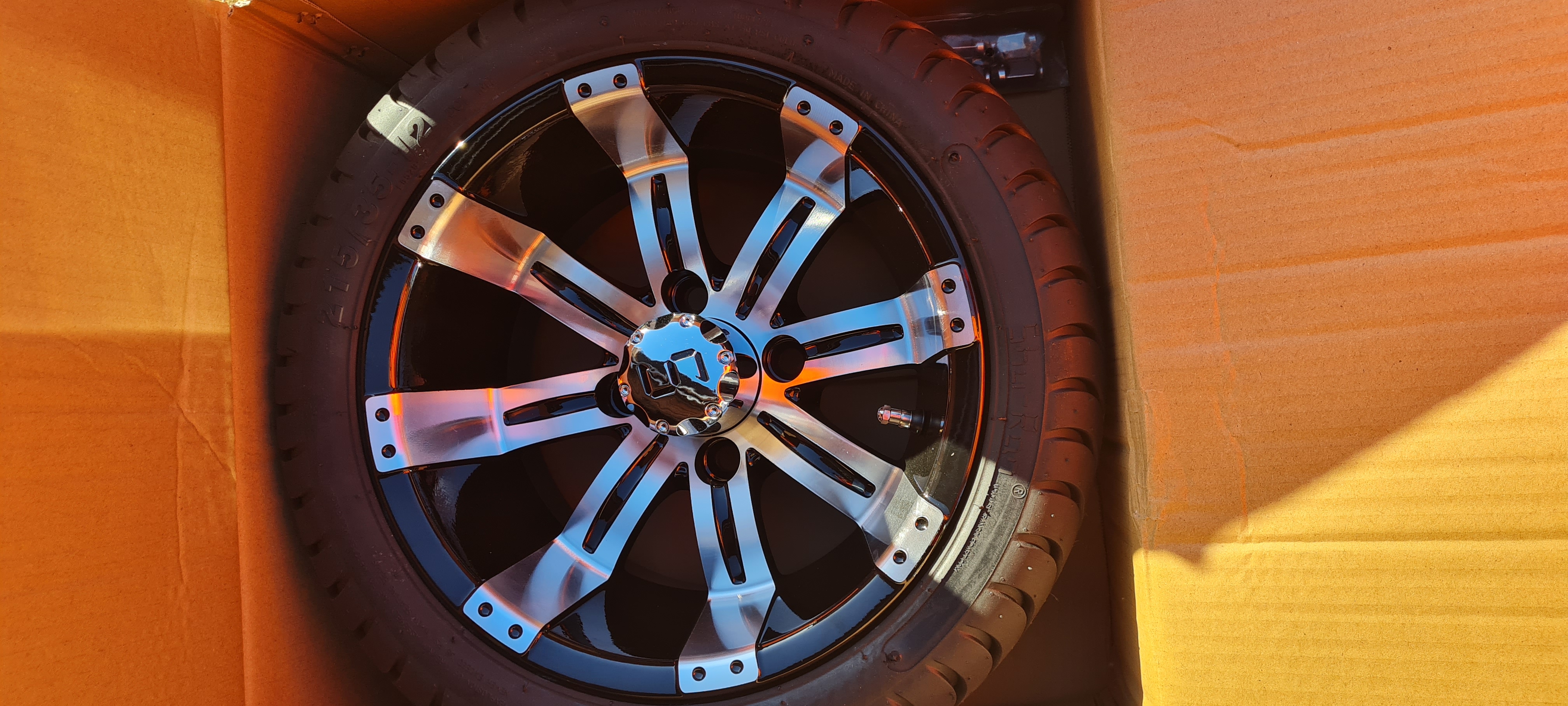 Chrome 10-spoke mag wheel with tyre